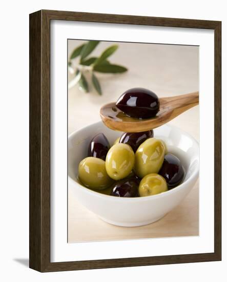 Green and Black Olives in Small Dish and on Wooden Spoon-Barbara Kraske-Framed Photographic Print