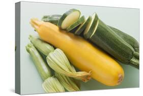 Green and Yellow Courgettes with Courgette Flowers-Eising Studio - Food Photo and Video-Stretched Canvas