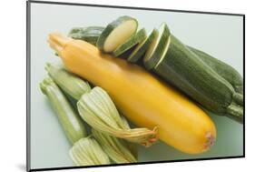 Green and Yellow Courgettes with Courgette Flowers-Eising Studio - Food Photo and Video-Mounted Photographic Print