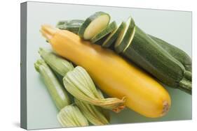 Green and Yellow Courgettes with Courgette Flowers-Eising Studio - Food Photo and Video-Stretched Canvas