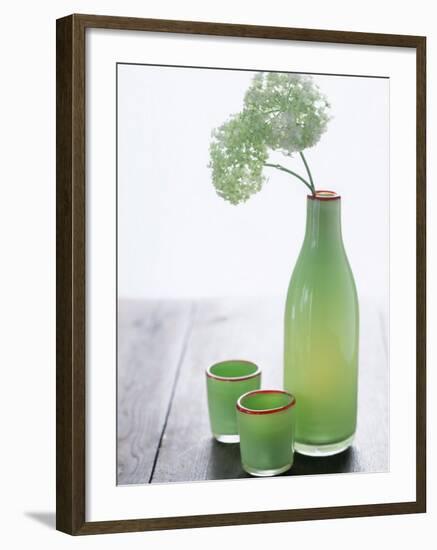 Green Bottle with Flowers and Green Glasses-Alena Hrbkova-Framed Photographic Print