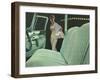 Green Car Interior with Dressed Up Woman-null-Framed Art Print