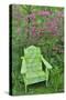 Green chair and azalea in bloom, Chanticleer Garden, Wayne, Pennsylvania.-Darrell Gulin-Stretched Canvas