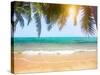 Green Leaves of Palm Tree and Tropical Beach-Aleksandr Ozerov-Stretched Canvas