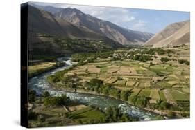 Green of irrigated fields contrast with arid hills, farmers ingenuity in dry landscape, Afghanistan-Alex Treadway-Stretched Canvas