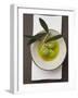 Green Olives on Twig in Bowl of Olive Oil-null-Framed Photographic Print