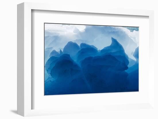 Greenland, Ilulissat, Midday sun lights melting iceberg near face of Eqip Glacier-Paul Souders-Framed Photographic Print