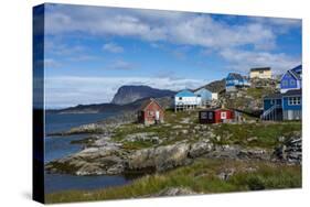 Greenland. Itilleq. Colorful houses dot the hillside.-Inger Hogstrom-Stretched Canvas