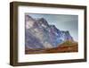 Greenland. Kong Oscar Fjord. Ella Island. Hiker dwarfed by rocky mountains.-Inger Hogstrom-Framed Photographic Print