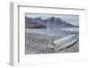 Greenland, Kong Oscar Fjord. Ella Island. Weathered boat on the shore.-Inger Hogstrom-Framed Photographic Print