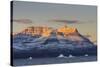 Greenland. Scoresby Sund. Gasefjord, Alpenglow on the mountain with iceberg.-Inger Hogstrom-Stretched Canvas