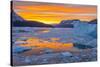 Greenland, Scoresby Sund, Gasefjord. Sunset with icebergs and brash ice.-Inger Hogstrom-Stretched Canvas