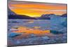 Greenland, Scoresby Sund, Gasefjord. Sunset with icebergs and brash ice.-Inger Hogstrom-Mounted Photographic Print