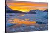 Greenland, Scoresby Sund, Gasefjord. Sunset with icebergs and brash ice.-Inger Hogstrom-Stretched Canvas