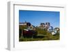 Greenland. Sisimiut. Fishing boats and colorful houses.-Inger Hogstrom-Framed Photographic Print