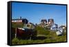 Greenland. Sisimiut. Fishing boats and colorful houses.-Inger Hogstrom-Framed Stretched Canvas