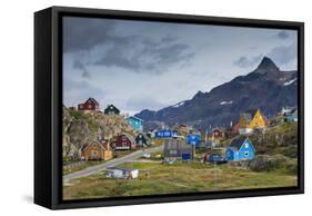 Greenland, Sisimiut. Nasaasaaq mountain towering above colorful Sisimiut.-Inger Hogstrom-Framed Stretched Canvas