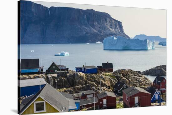 Greenland. Uummannaq. Colorful houses dot the rocky landscape.-Inger Hogstrom-Stretched Canvas