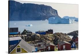 Greenland. Uummannaq. Colorful houses dot the rocky landscape.-Inger Hogstrom-Stretched Canvas