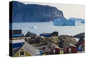 Greenland. Uummannaq. Colorful houses dot the rocky landscape.-Inger Hogstrom-Stretched Canvas