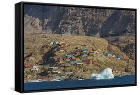 Greenland. Uummannaq. Colorful houses dot the rocky landscape.-Inger Hogstrom-Framed Stretched Canvas