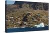 Greenland, Uummannaq. Colorful houses dot the rocky landscape.-Inger Hogstrom-Stretched Canvas