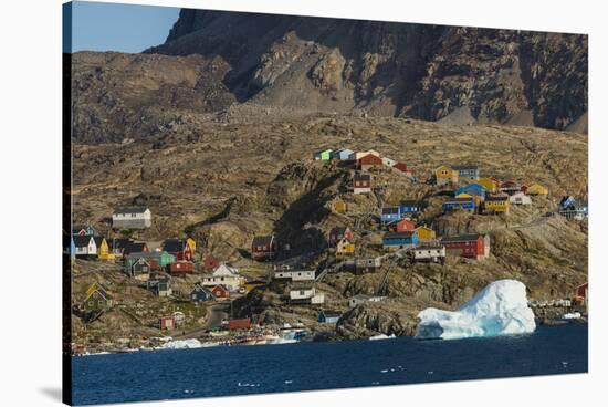 Greenland, Uummannaq. Colorful houses dot the rocky landscape.-Inger Hogstrom-Stretched Canvas