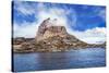 Greenland, Uummannaq. Uummannaq mountain (1170 m, 3839 ft) looms over the fishing village of Uumman-Miva Stock-Stretched Canvas