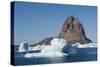 Greenland. Uummannaq. Uummannaq mountain and iceberg.-Inger Hogstrom-Stretched Canvas