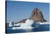 Greenland. Uummannaq. Uummannaq mountain and iceberg.-Inger Hogstrom-Stretched Canvas