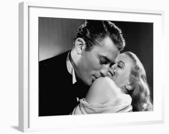 Gregory Peck Embracing Ann Todd in Publicity Still for Alfred Hitchcock's Film "The Paradine Case."-null-Framed Premium Photographic Print