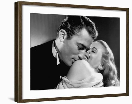 Gregory Peck Embracing Ann Todd in Publicity Still for Alfred Hitchcock's Film "The Paradine Case."-null-Framed Premium Photographic Print