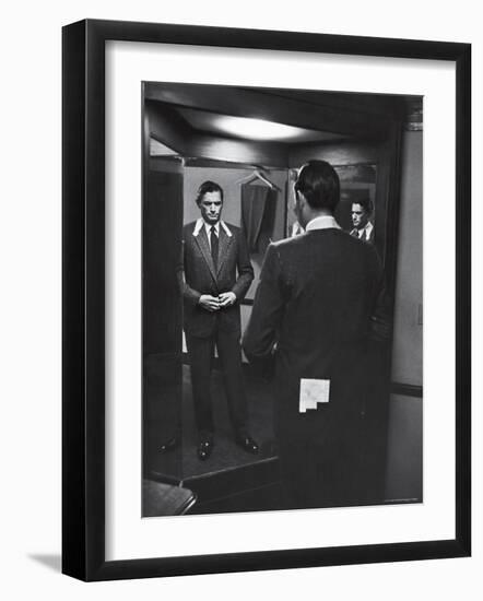 Gregory Peck Trying on Suit for His New Movie Man in the Grey Flannel Suit-Michael Rougier-Framed Premium Photographic Print