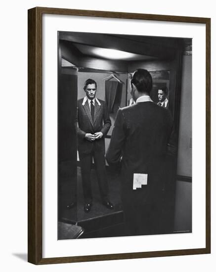 Gregory Peck Trying on Suit for His New Movie Man in the Grey Flannel Suit-Michael Rougier-Framed Premium Photographic Print