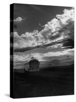 Greyhound Bus Driving Down Highway 30-Allan Grant-Stretched Canvas