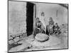 Grinding Grain in a Quern, Inishmurray, County Sligo, 1900-Robert John Welch-Mounted Giclee Print