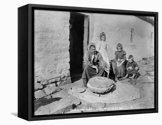 Grinding Grain in a Quern, Inishmurray, County Sligo, 1900-Robert John Welch-Framed Stretched Canvas