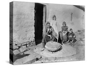 Grinding Grain in a Quern, Inishmurray, County Sligo, 1900-Robert John Welch-Stretched Canvas