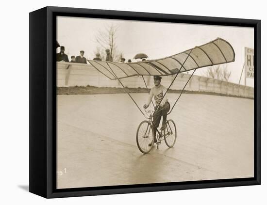 Grinning Cyclist Tries to Get His Glider Airborne at the Parc des Princes Stadium Paris-null-Framed Stretched Canvas