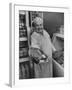 Grocer E.G. Guthart Displaying One of His Steaks-Francis Miller-Framed Photographic Print