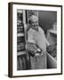 Grocer E.G. Guthart Displaying One of His Steaks-Francis Miller-Framed Photographic Print