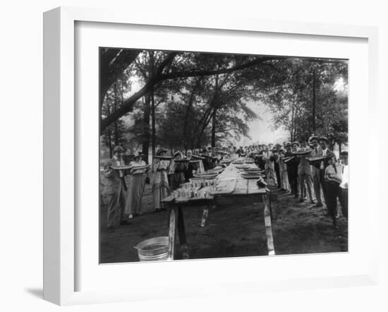 Group Eating Large Pieces of Watermelon Photograph - Fairfield, Alabama-Lantern Press-Framed Art Print