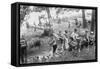 Group of Boys Carry Loaves of Bread from Wagons Near Beach Front in Woods.-null-Framed Stretched Canvas
