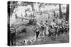 Group of Boys Carry Loaves of Bread from Wagons Near Beach Front in Woods.-null-Stretched Canvas