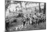 Group of Boys Carry Loaves of Bread from Wagons Near Beach Front in Woods.-null-Mounted Art Print