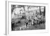 Group of Boys Carry Loaves of Bread from Wagons Near Beach Front in Woods.-null-Framed Art Print