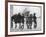 Group of Boys Lean Against the Dock Railings and Watch a Steamship Being Built-null-Framed Art Print