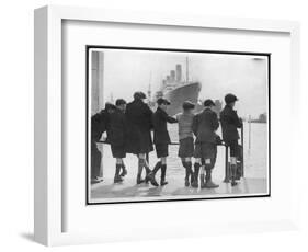 Group of Boys Lean Against the Dock Railings and Watch a Steamship Being Built-null-Framed Art Print