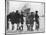 Group of Boys Lean Against the Dock Railings and Watch a Steamship Being Built-null-Stretched Canvas