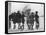 Group of Boys Lean Against the Dock Railings and Watch a Steamship Being Built-null-Framed Stretched Canvas